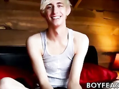 Skinny blonde twink Erik Tribold stroking his long hard dick